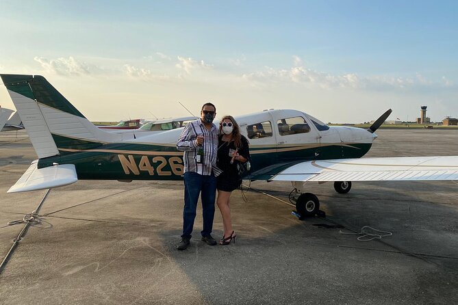 New Orleans Night Sightseeing Flight - Port of New Orleans wharf fly-by: a working city view
